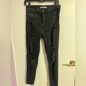 Levi’s black distressed skinny jeans